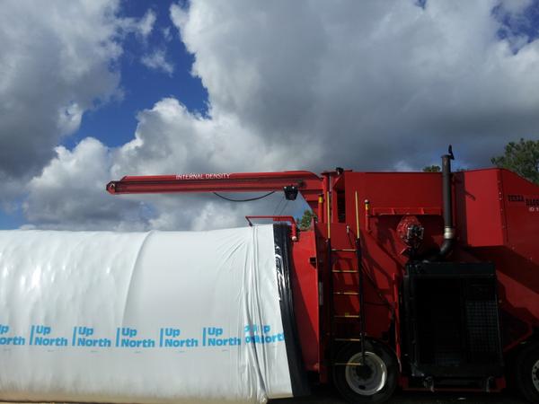 Photo of a silo bag being filled.